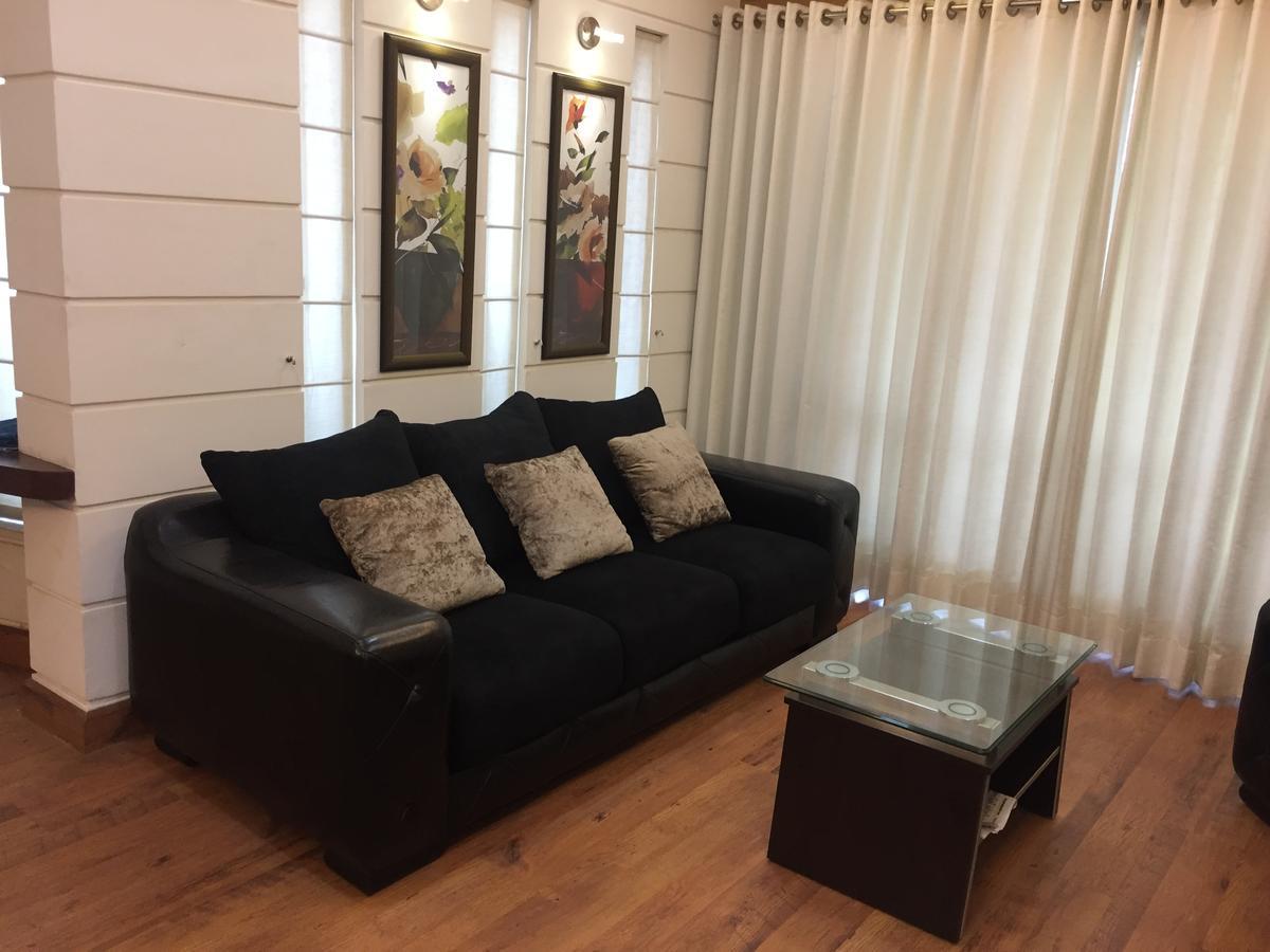 Beautiful Apartments At Tarudhan Valley Golf Resort, Manesar 古尔冈 外观 照片